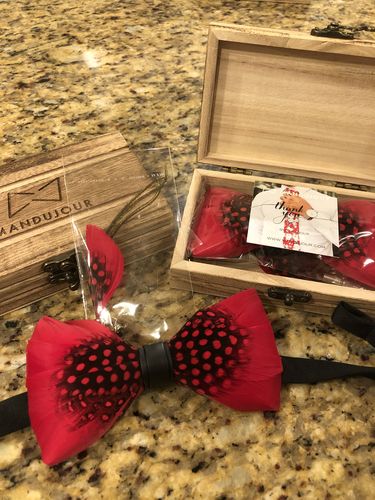 Customer photo review of Red Black Guinea Fowl Feather Bow tie & lapel pin set