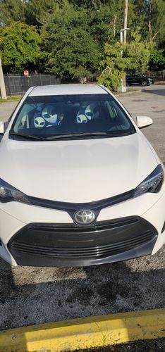 Customer photo review of Grey Alien Face Pattern Print Universal Fit Car Seat Covers