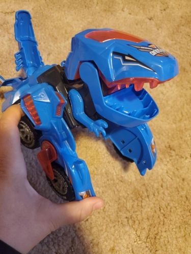 Customer photo review of AUTOMATIC TRANSFORMING DINOSAUR CAR WITH MUSIC AND LED LIGHT (80% OFF)