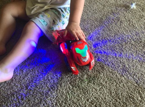 Customer photo review of AUTOMATIC TRANSFORMING DINOSAUR CAR WITH MUSIC AND LED LIGHT (80% OFF)