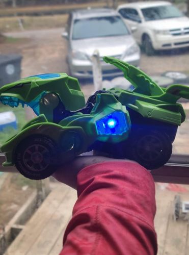 Customer photo review of AUTOMATIC TRANSFORMING DINOSAUR CAR WITH MUSIC AND LED LIGHT (80% OFF)