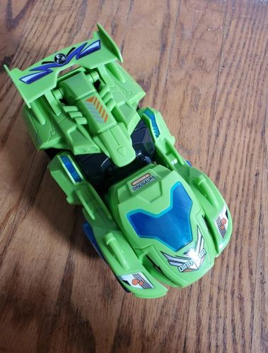 Customer photo review of AUTOMATIC TRANSFORMING DINOSAUR CAR WITH MUSIC AND LED LIGHT (80% OFF)