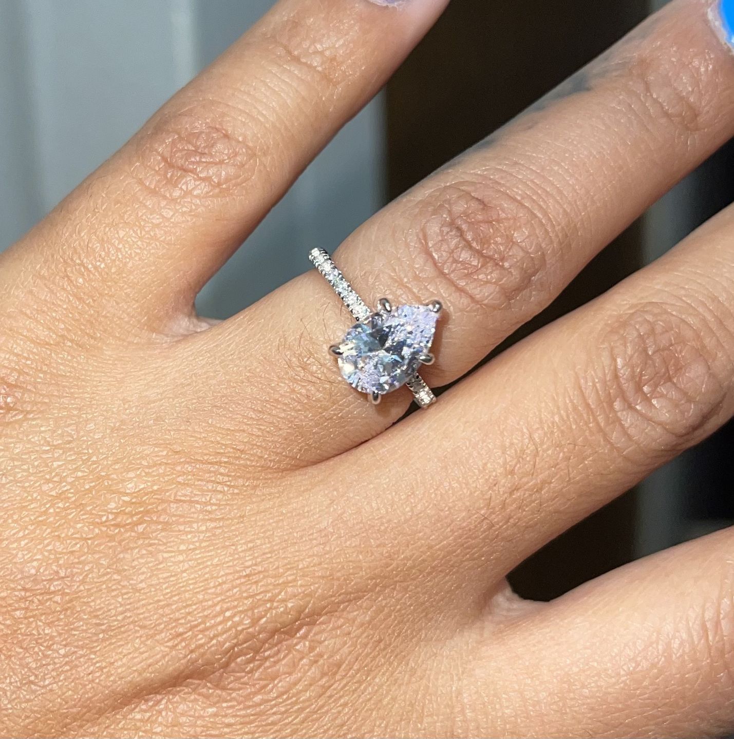 Customer photo review of Pear Cut Moissanite Pavé Engagement Ring