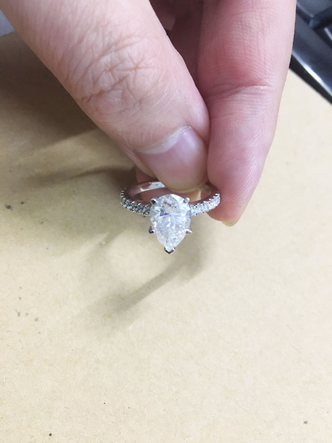 Customer photo review of Pear Cut Moissanite Pavé Engagement Ring