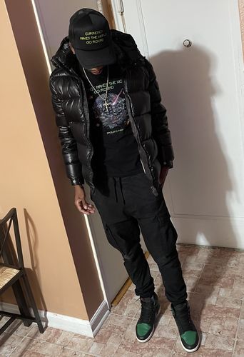 Customer photo review of Currency Tee