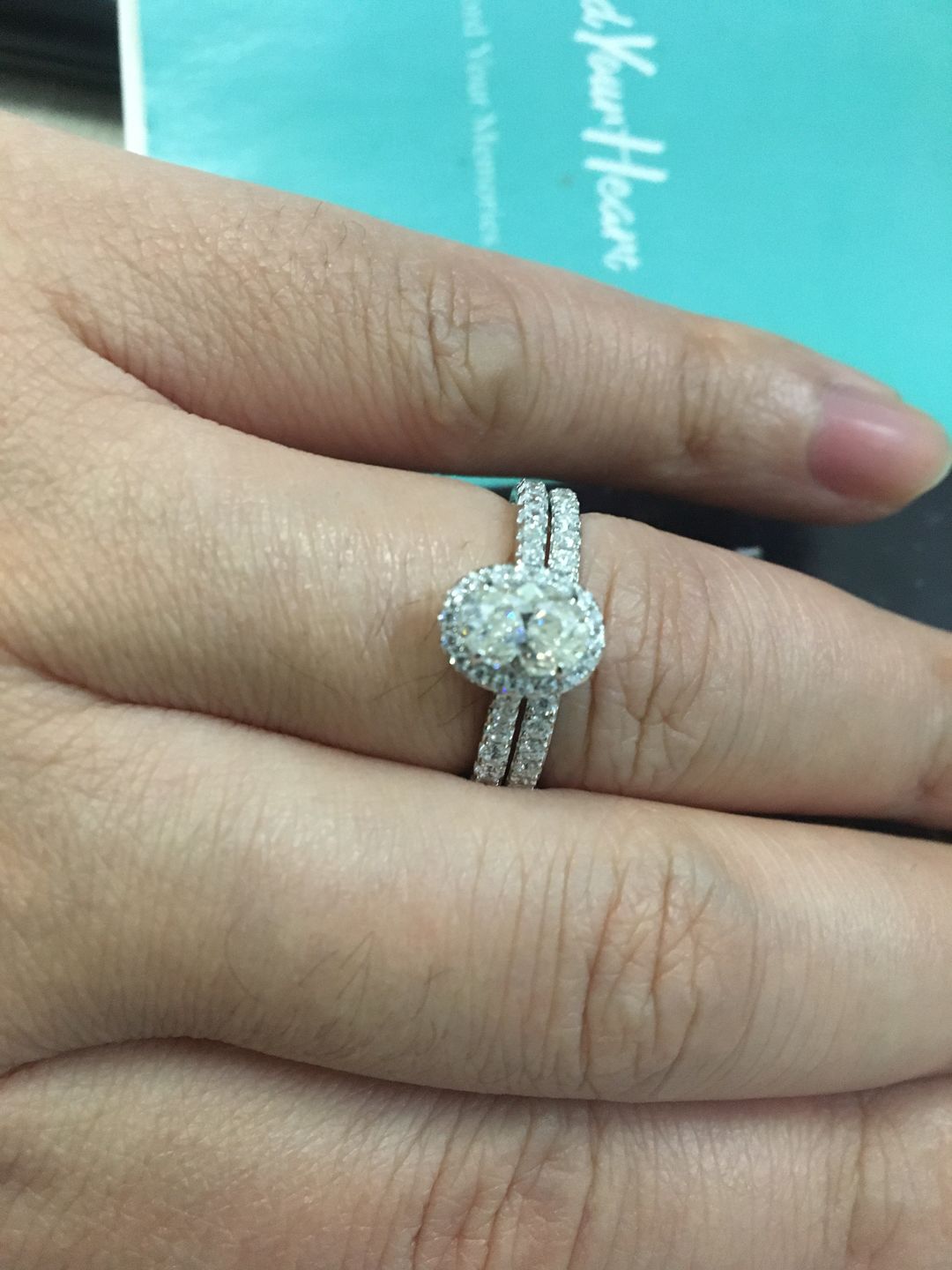 Customer photo review of Halo Oval Cut Moissanite Pave Sterling Silver Engagement Ring