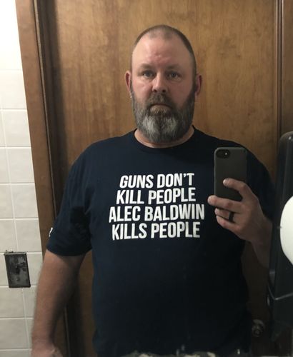 Customer photo review of Guns Don't Kill People Men's Apparel