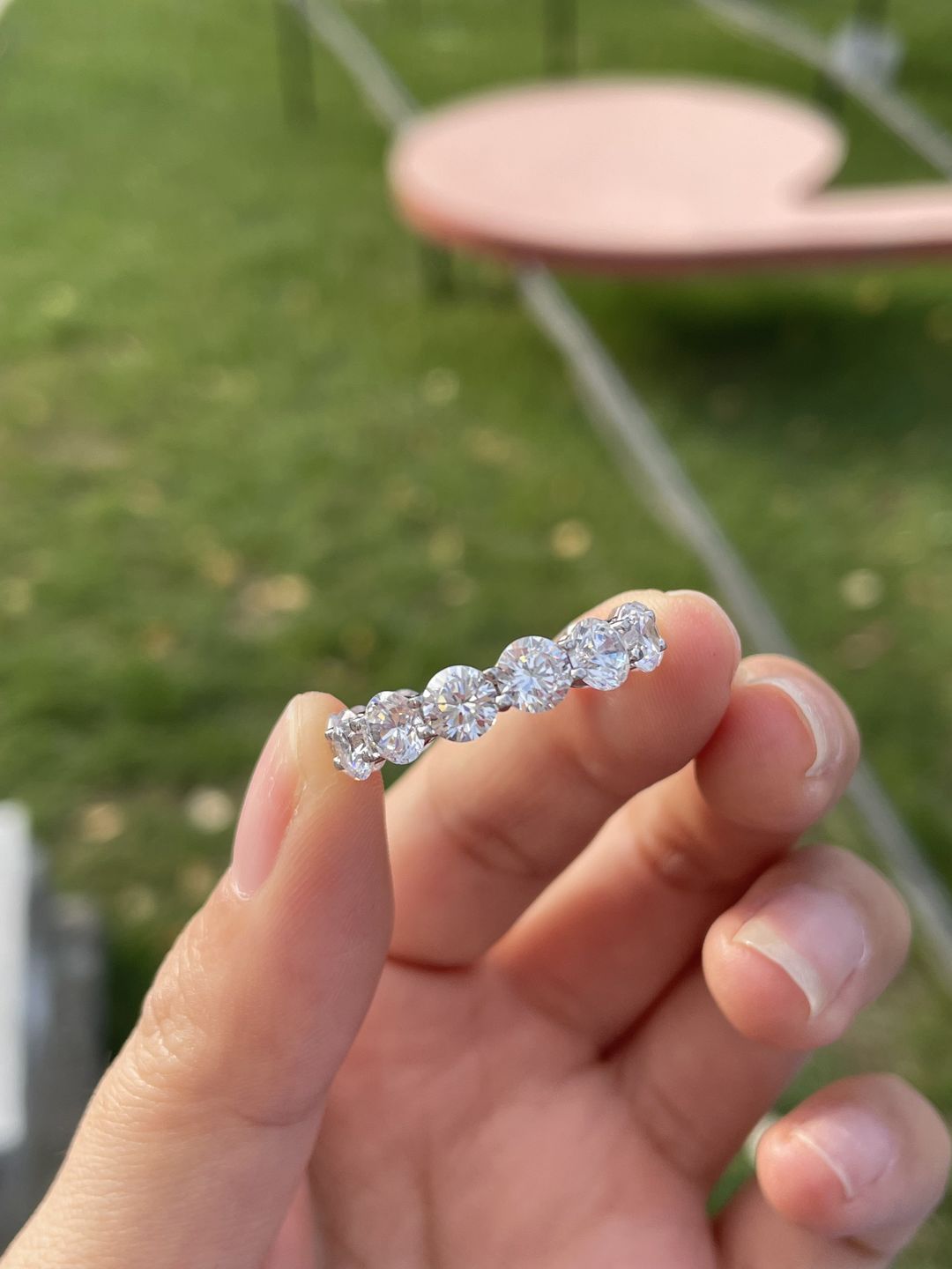 Customer photo review of Louily Classic Eternity Round Cut Women's Wedding Band In Sterling Silver