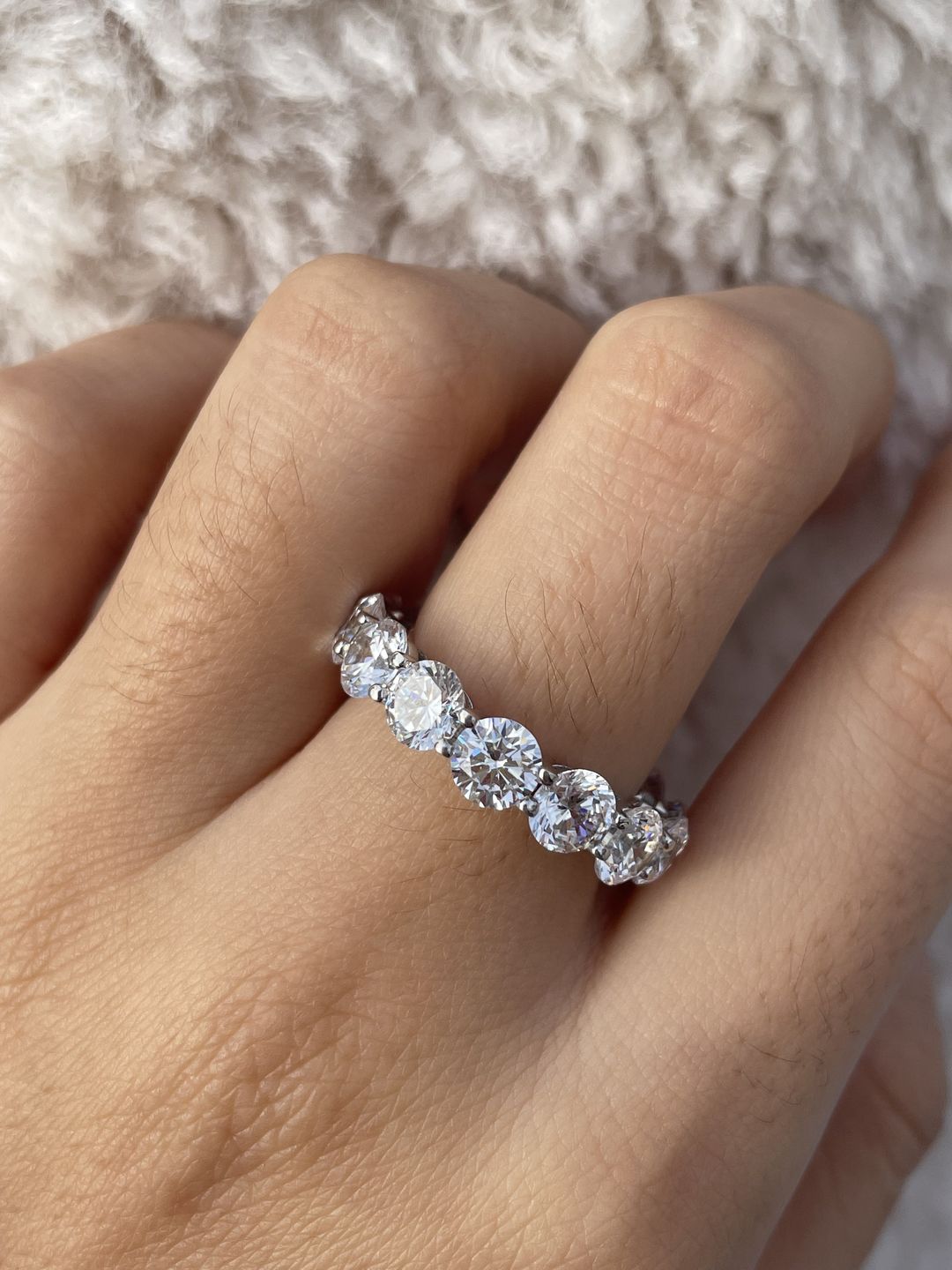Customer photo review of Louily Classic Eternity Round Cut Women's Wedding Band In Sterling Silver