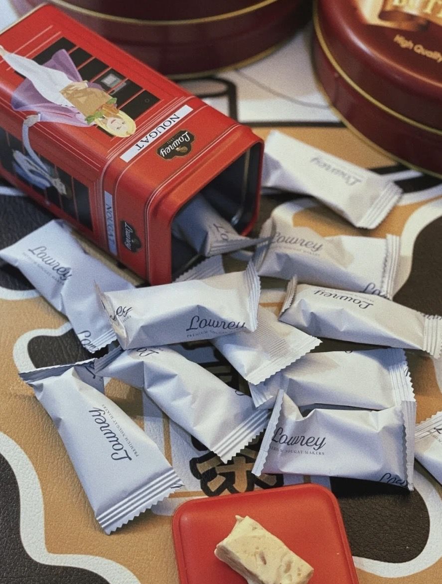 Customer photo review of Lowrey Nougat 4 Tins Value Pack | Almond & Peanut Nougat