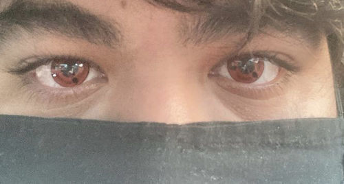 Customer photo review of MOJOSEE Sharingan Itachi Colored Contact Lenses