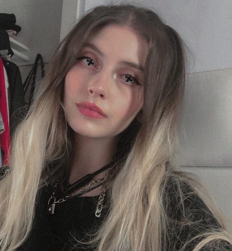 Customer photo review of MOJOSEE Black Cross Colored Contact Lenses
