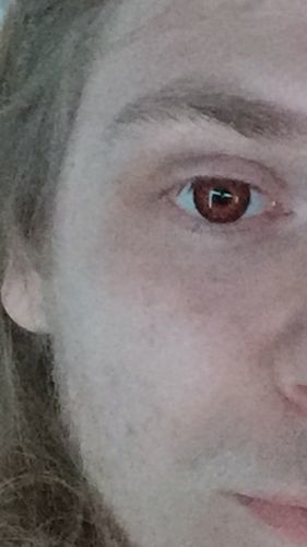 Customer photo review of MOJOSEE Anime Red Colored Contact Lenses