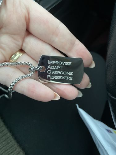 Customer photo review of Engravable Detailed Dog Tag