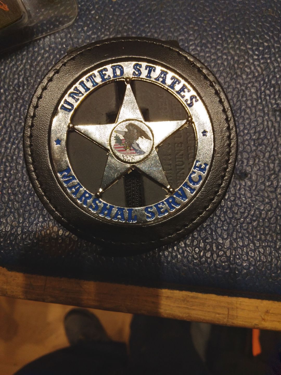 Customer photo review of US Federal Court Law Enforcement MARSHAL Badge Solid Copper Replica Movie Props