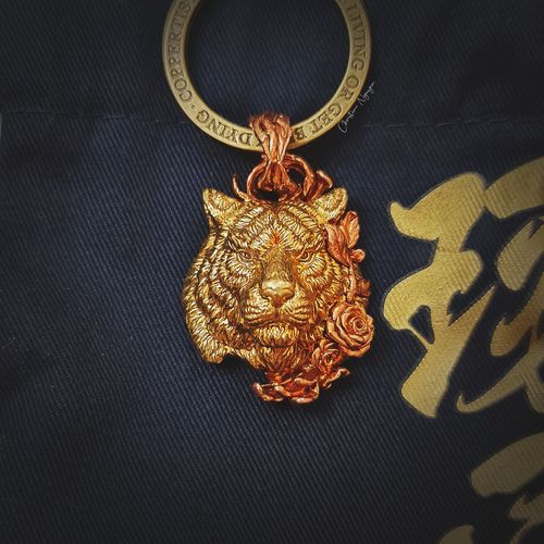 Customer photo review of Brass Tiger Pendant