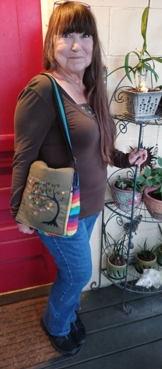 Customer photo review of Stay Rooted Messenger Bag