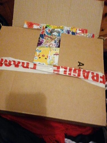 Customer photo review of LOTTE - POKEMON CHOCOLATE WAFER BISCUIT AND STICKER (23G)