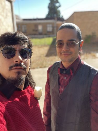 Customer photo review of Black and Red Feather Bow Ties lapel Pin Set