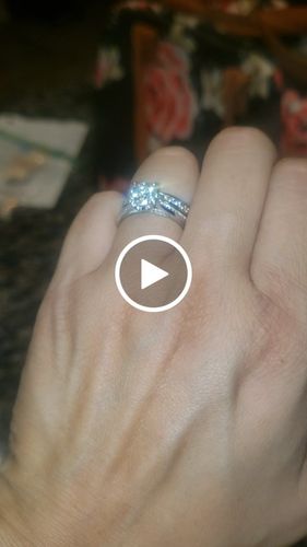 Customer video review of Fashion Four Prong Round Moissanite Side Stone Sterling Silver Wedding Ring
