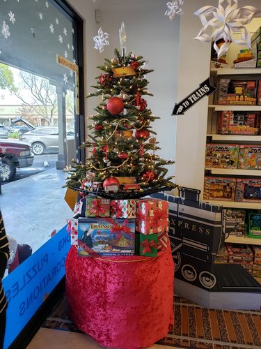 Customer photo review of Train Enthusiast Vendors 15994 Polar Express Train-Opoly Game