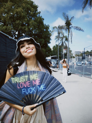 Customer photo review of Trust Me Love Me Fuck Me Hand Fan - UV