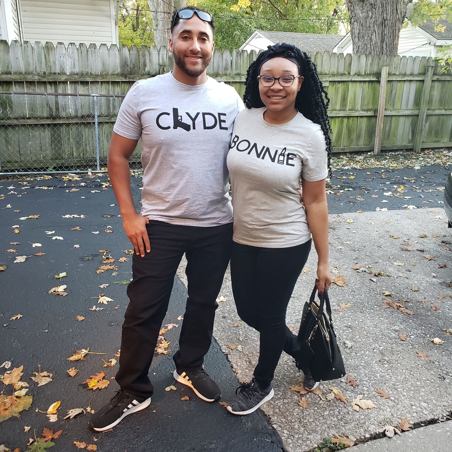 Happy couple wearing matching hoodies