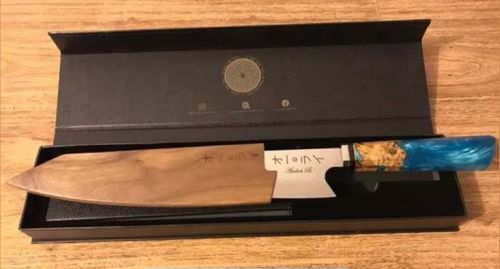 Customer photo review of Cuchillo Kiritsuke de Acero Damasco Japonés Premium Incluye Saya Magnética
