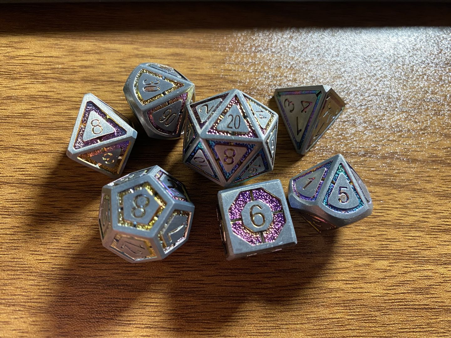 Customer photo review of CLERIC'S DOMAIN SILVER IRIDESCENT METAL DICE SET