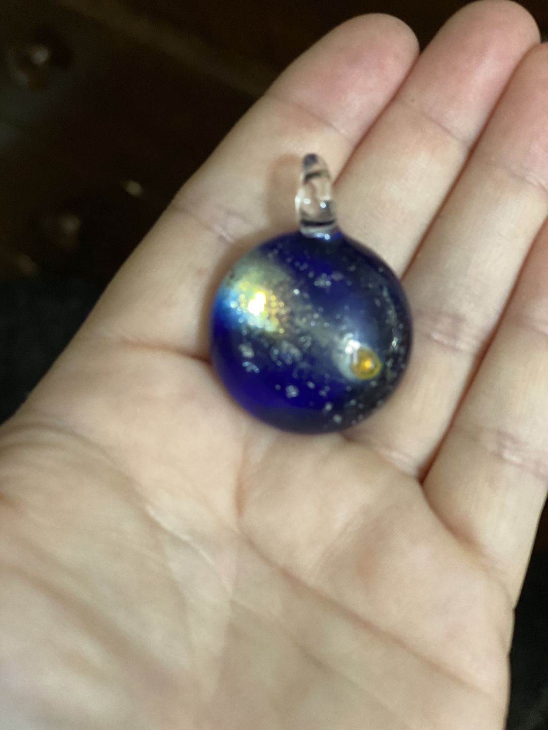 Customer photo review of Halley's Comet Glass Pendant