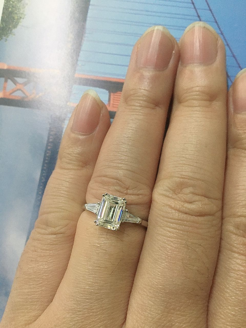 Customer photo review of Three Stone Emerald Cut Moissanite Tapered Baguette Engagement Ring