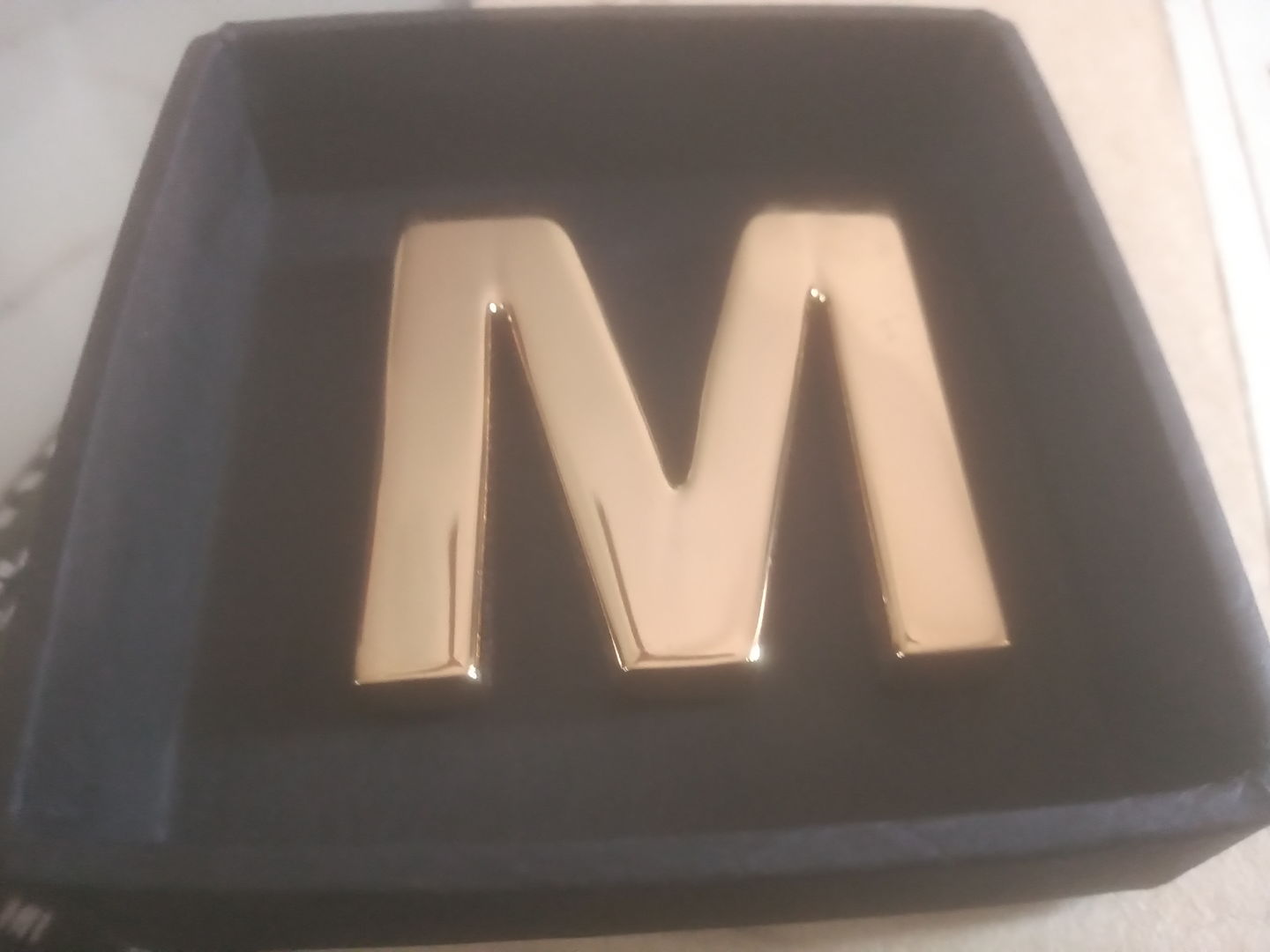 Customer photo review of Paperweight Alphabet M