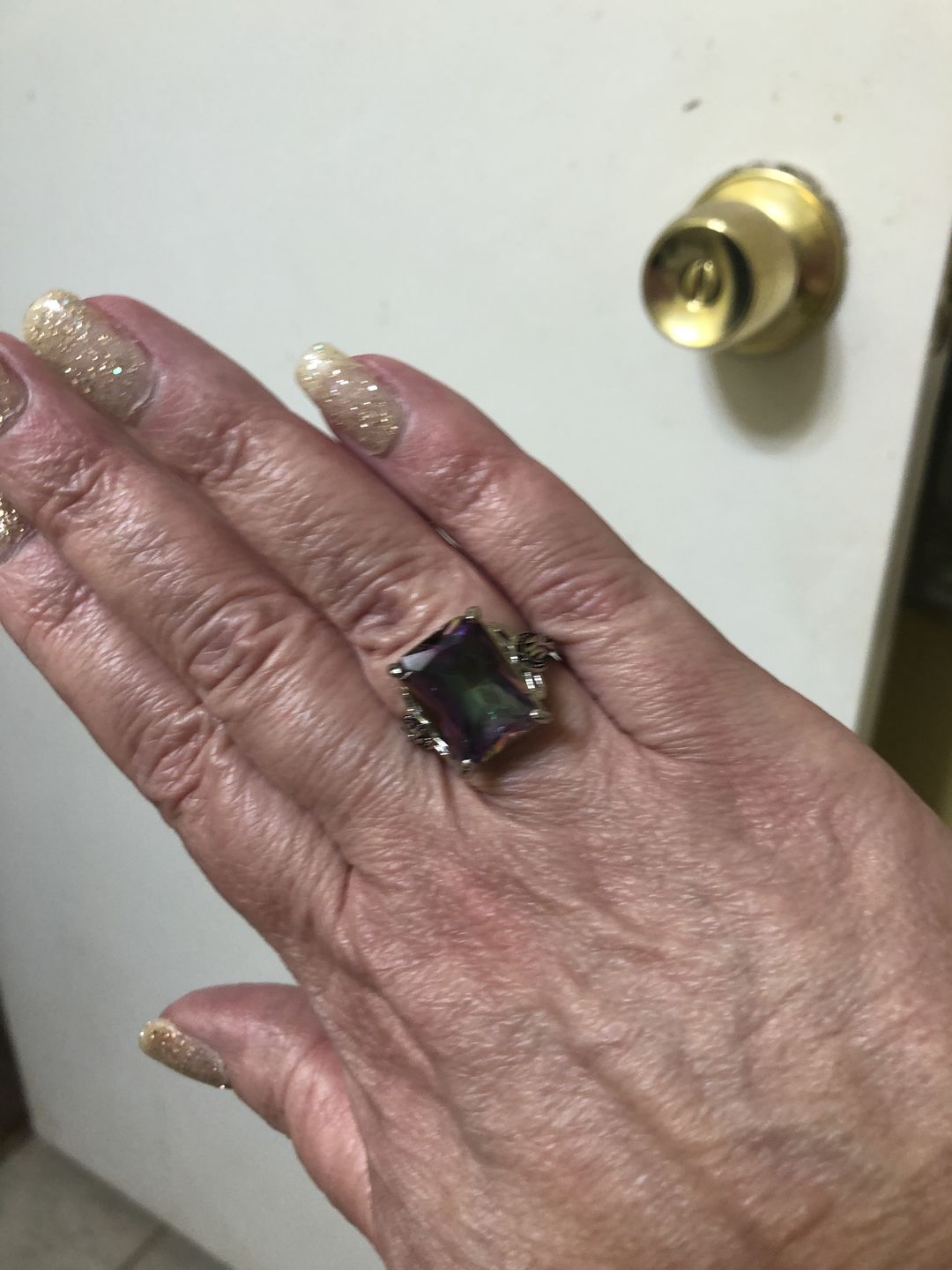 Customer photo review of Enormous Rainbow Mystic Topaz Ring