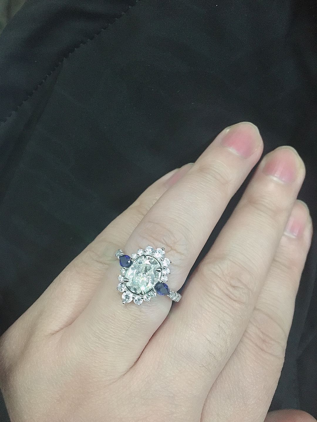 Customer photo review of Halo Oval Moissanite Pear Sapphire Sidestone Pave Engagement Ring