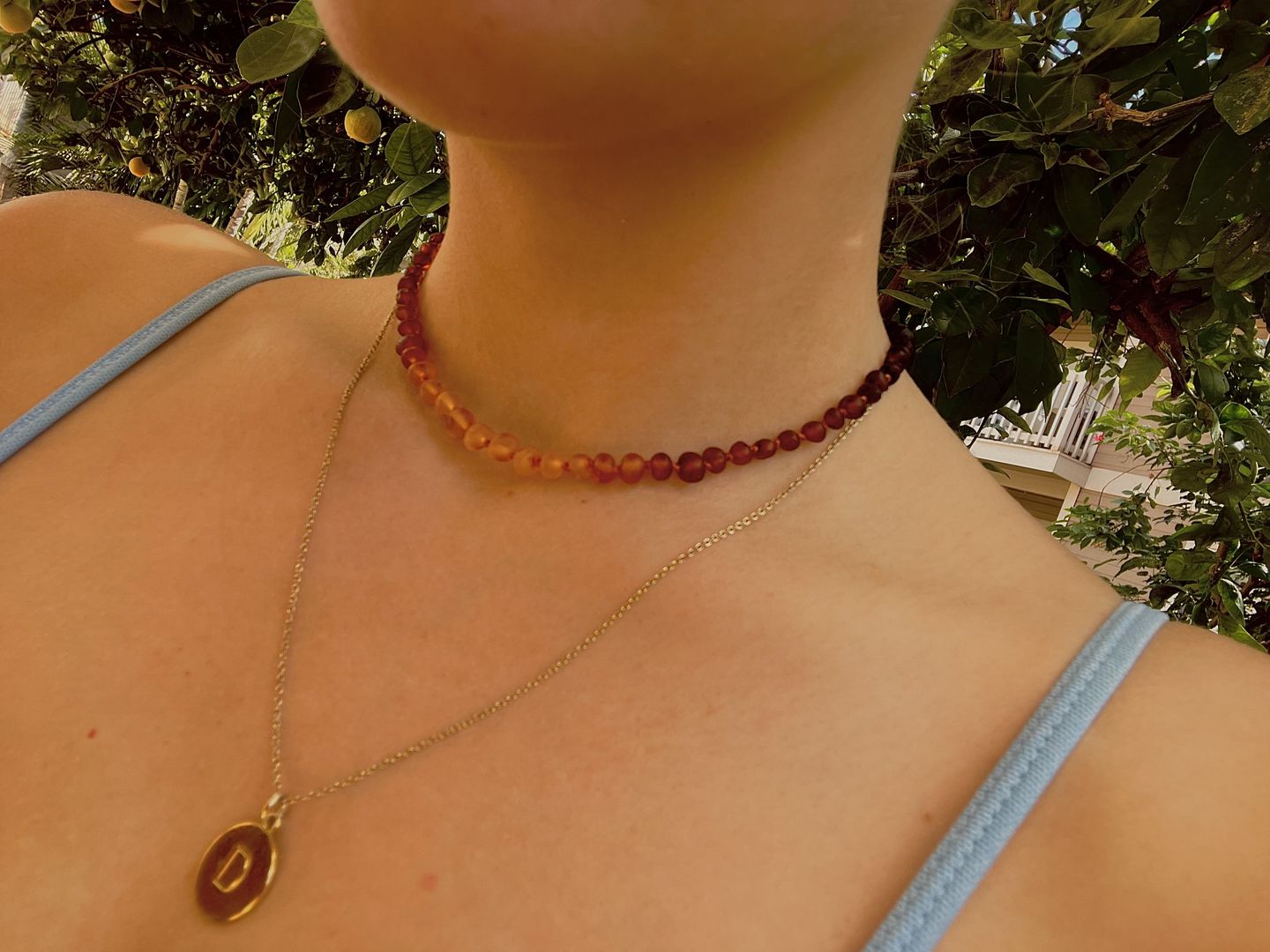 Customer photo review of Raw Ombre Amber Necklace