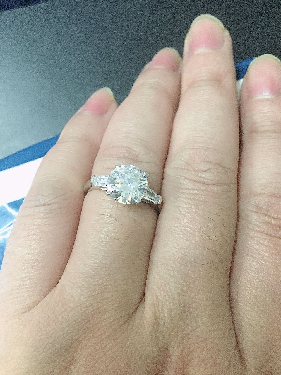 Customer photo review of Three Stone Round Moissanite Tapered Baguette Engagement Ring