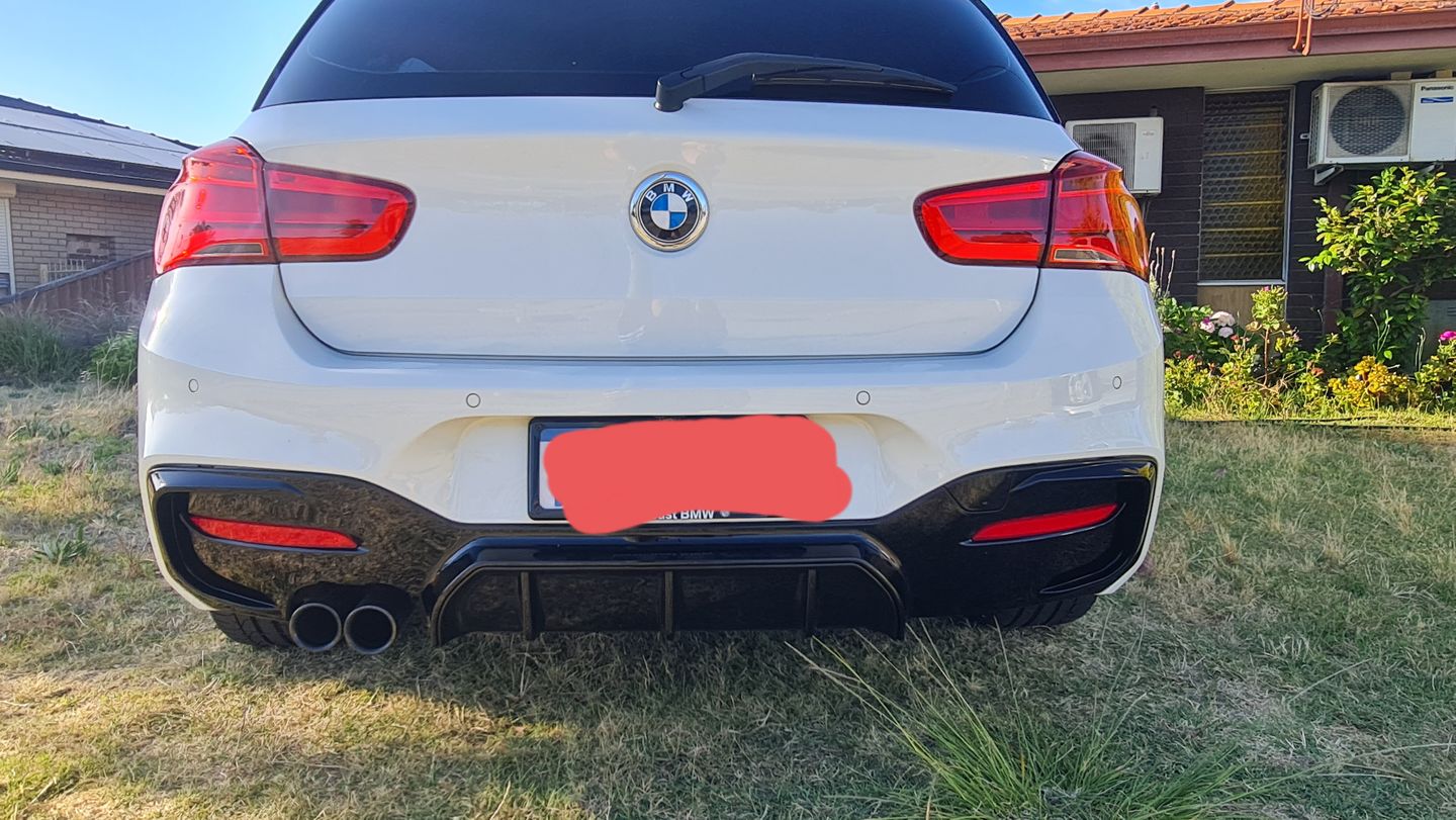 Customer photo review of ABS Glossy Black Rear Bumper Diffuser for BMW 1 Series【F20 M140/M135 & 125/120/118 M Sport】【2015-2019】LCI/LCI-2【left】