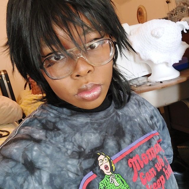 Customer photo review of Men Black Long Straight Fringe Bangs Layered Mullet Cosplay Wig