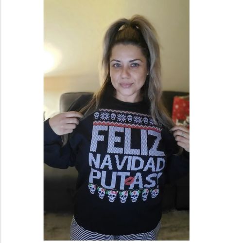 Customer photo review of Feliz Navidad Putas OG Navidad Sweatshirt