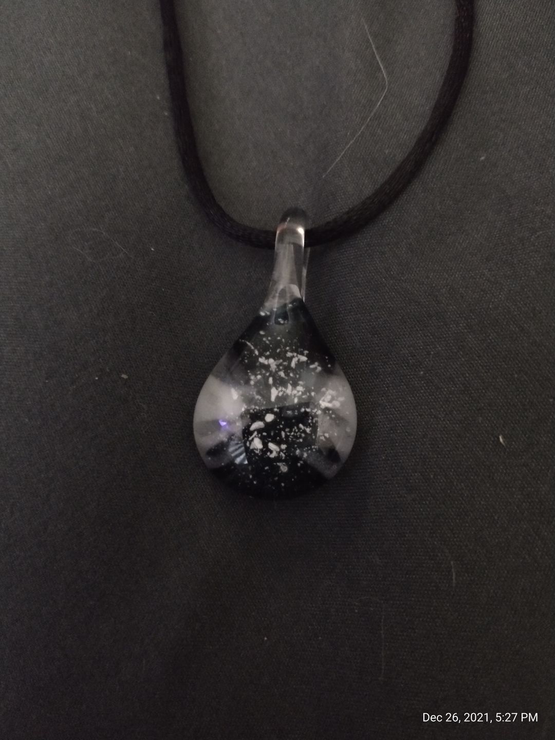 Customer photo review of Ocean Crash Pendant with Infused Cremation Ashes