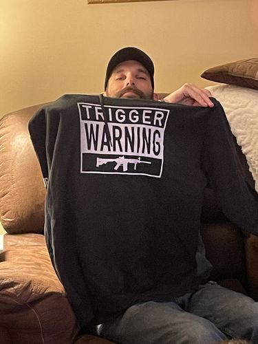 Customer photo review of Trigger Warning Men's Apparel