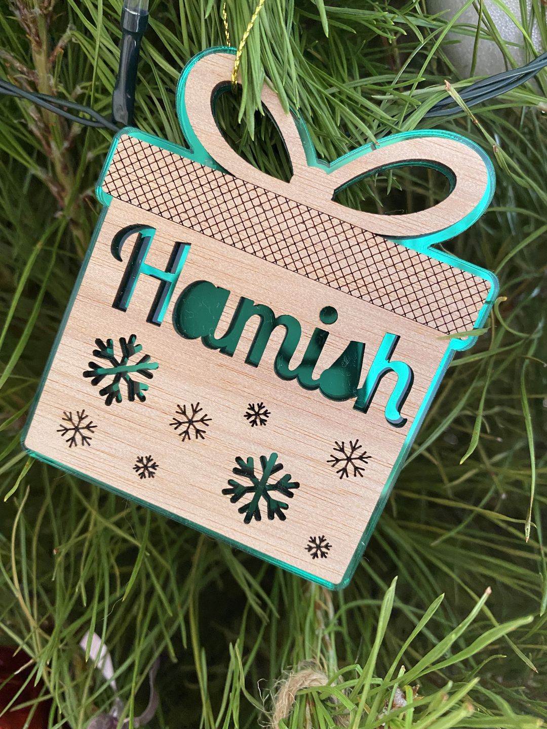 Customer photo review of Personalised Mirror and Wood Christmas Ornaments