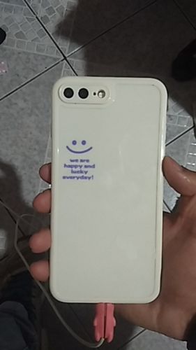 Customer photo review of Lucky and Happy Smiley iPhone Case