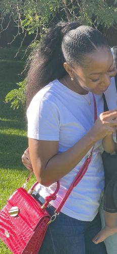 Customer photo review of Kinky Straight Clip In Ponytail - 18"