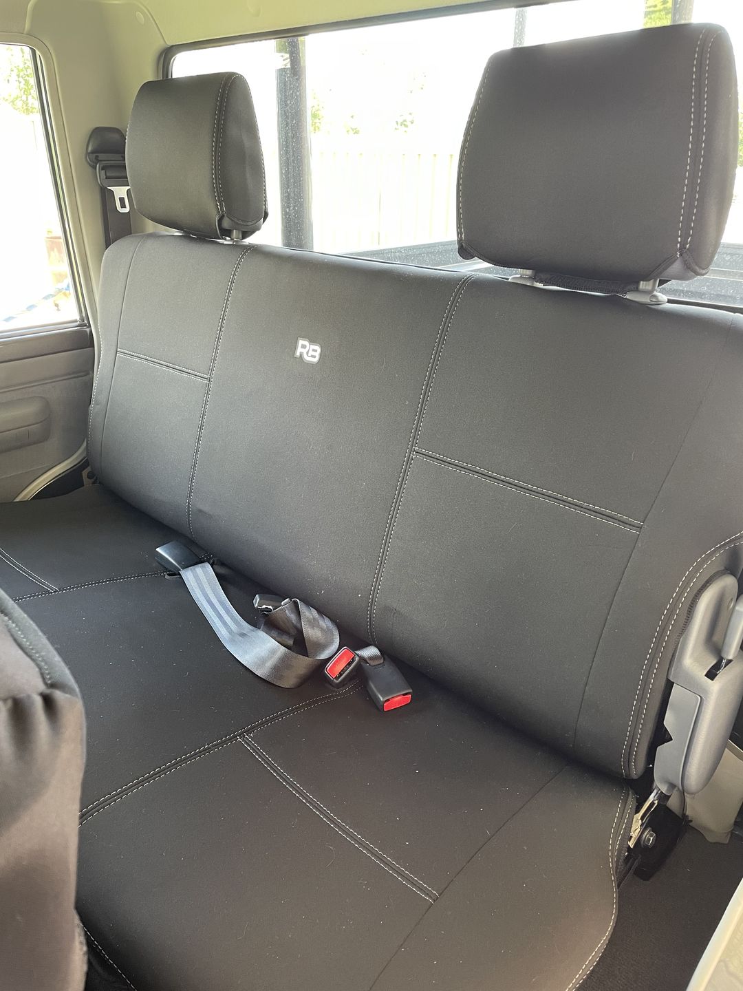 Customer photo review of Toyota Landcruiser 79 Neoprene Rear Row Seat Covers (Available)