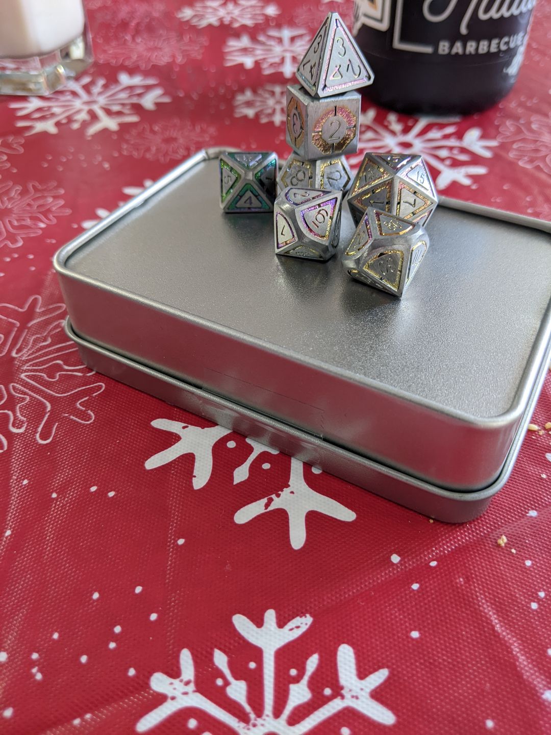 Customer photo review of CLERIC'S DOMAIN SILVER IRIDESCENT METAL DICE SET