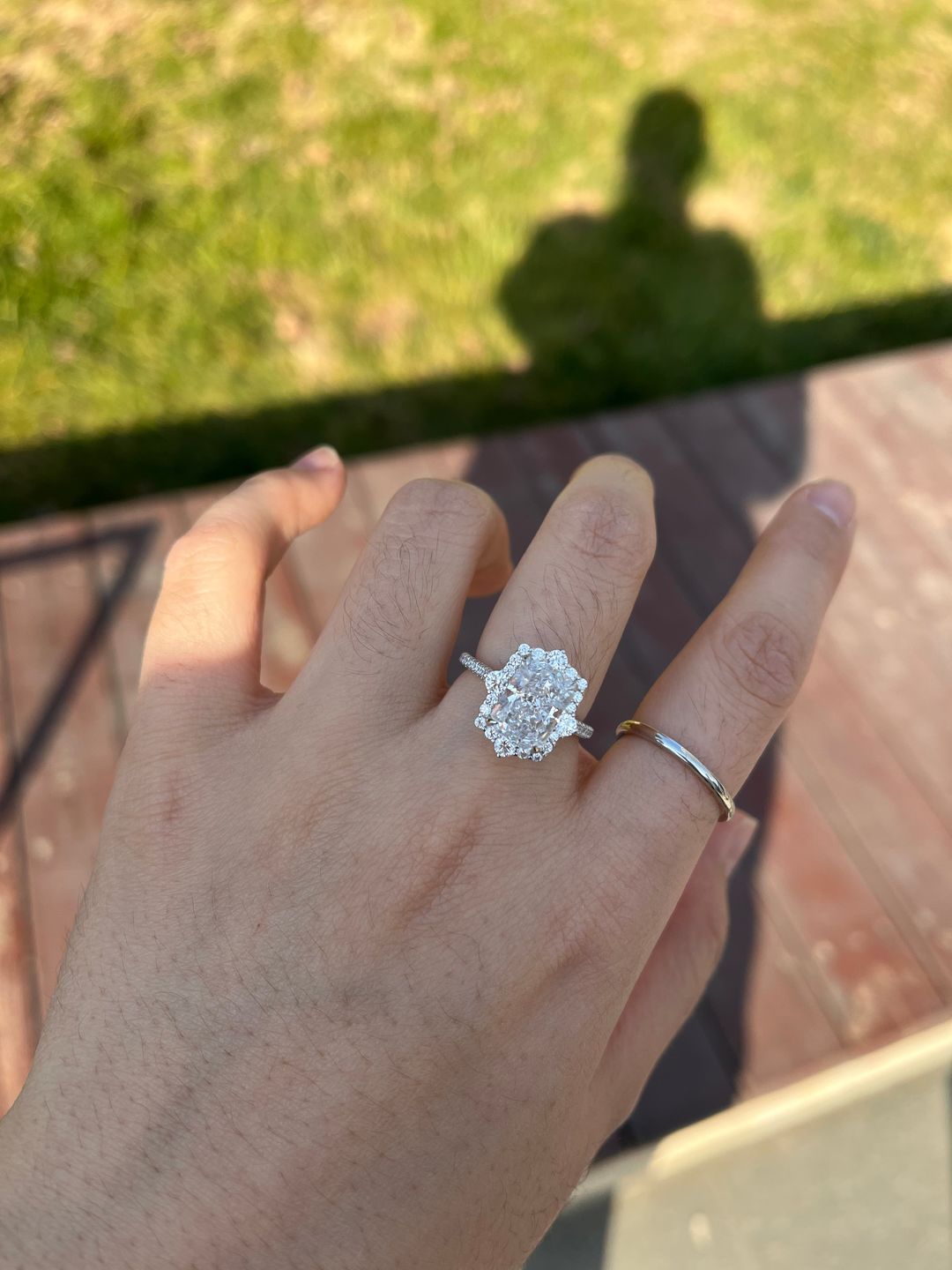 Customer photo review of S925 Gorgeous Halo 3.5Ct  Radiant Cut Simulated Diamond Engagement Ring In Sterling Silver
