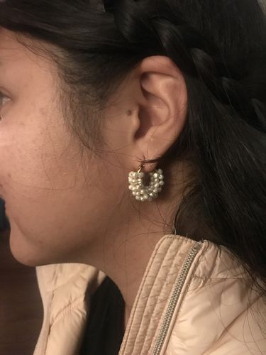 Customer photo review of Perla Mini Hoop Earrings