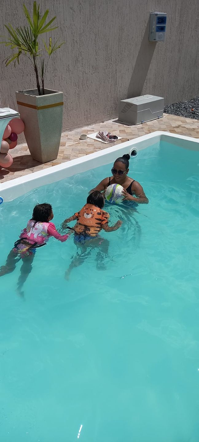 Customer photo review of Camisa Flutuadora Infantil Floater
