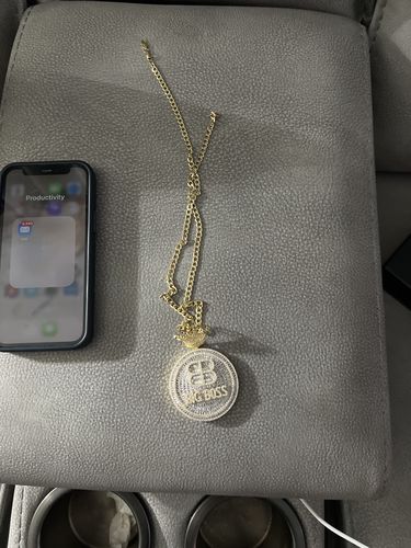 Customer photo review of Gold Flawless Baguette Big Boss Medallion